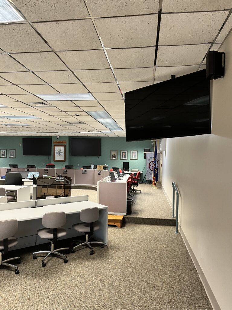 Iberia Parish School District boardroom with large displays and meeting room AV system