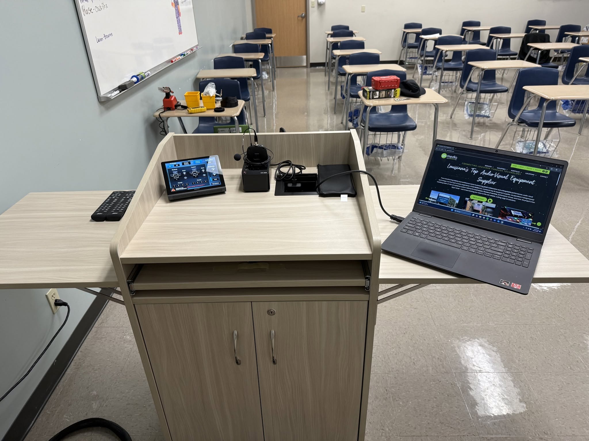 Wireless presentation system installed in a modern conference room by Go Media LLC.
